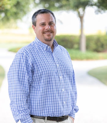 Portrait of Pat Mahaney, Broker.